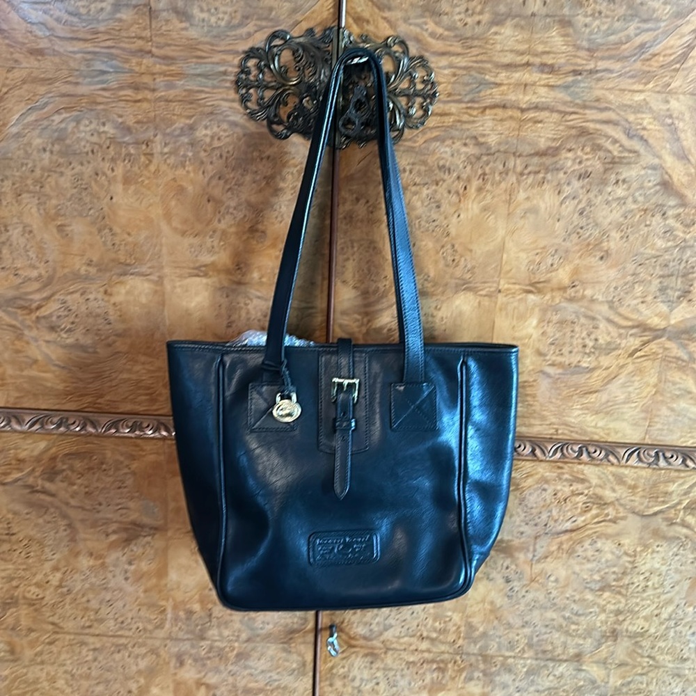 Vintage Dooney & Bourke black leather tote in excellent condition. No dust bag.
